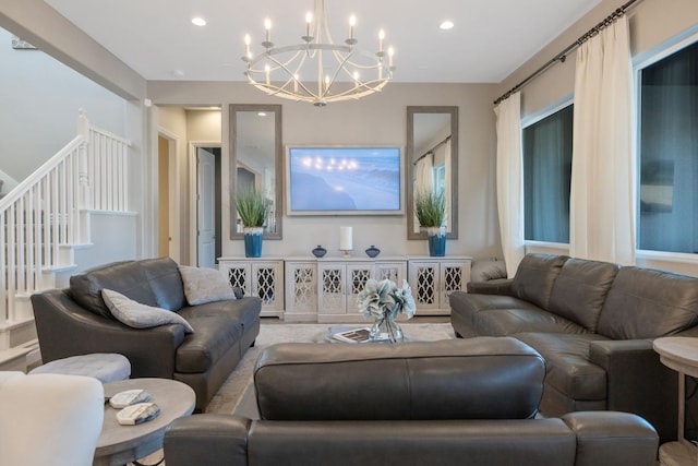 living room with an inviting chandelier