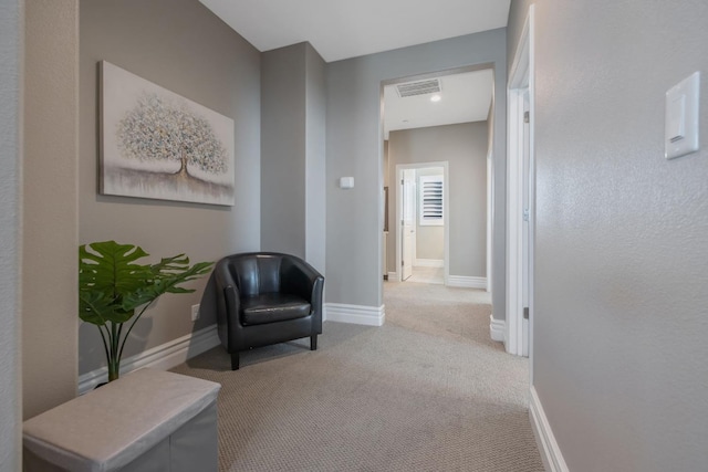 living area with carpet floors