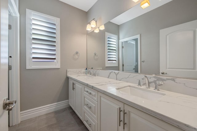 bathroom featuring vanity and tile patterned flooring