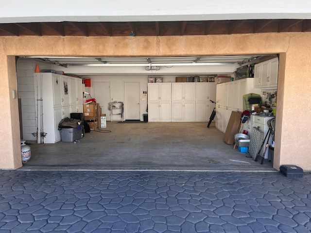 garage featuring a garage door opener