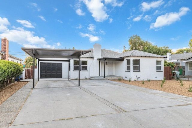 ranch-style house featuring a garage