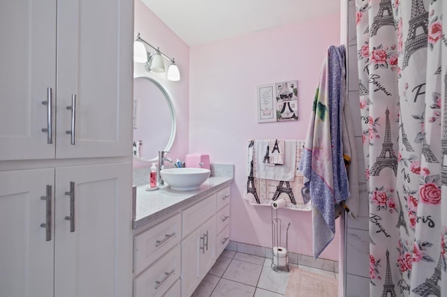 bathroom featuring tile patterned flooring, vanity, and a shower with shower curtain