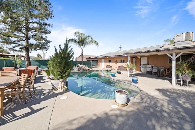 view of pool featuring central air condition unit, a patio, and area for grilling