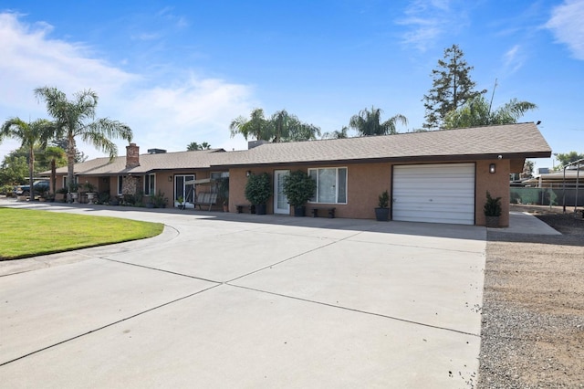 ranch-style home with a garage