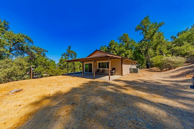 back of house featuring a patio and central AC unit