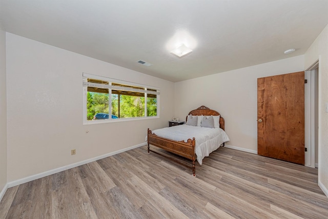 bedroom featuring light hardwood / wood-style flooring