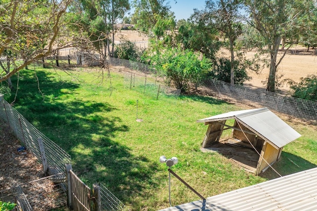 view of yard with a rural view