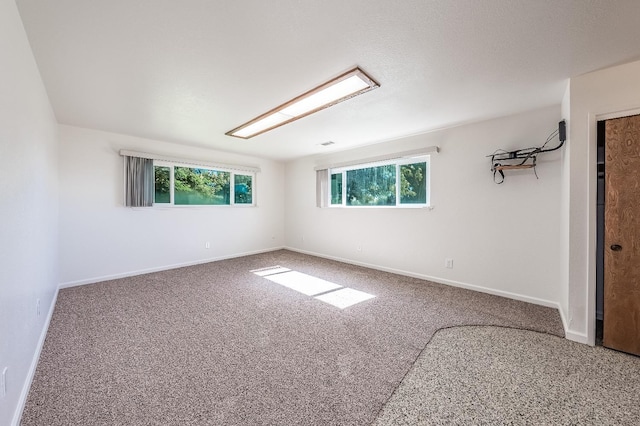 spare room with carpet flooring