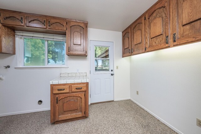 kitchen featuring tile countertops