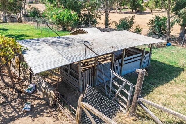 wooden deck featuring a rural view