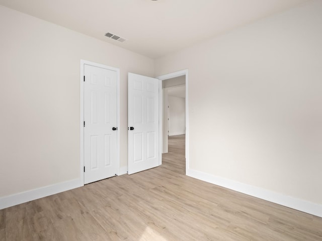 unfurnished bedroom with light hardwood / wood-style flooring