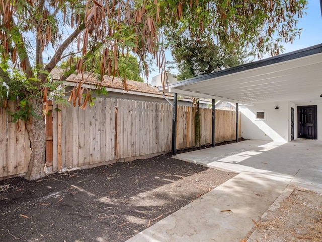 view of yard featuring a carport