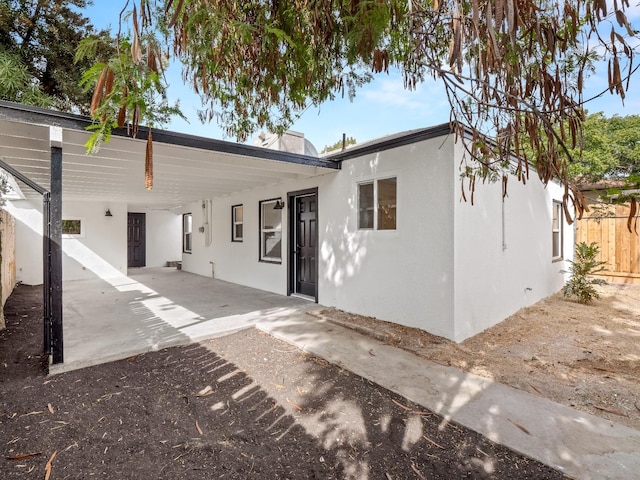 rear view of property with a patio area