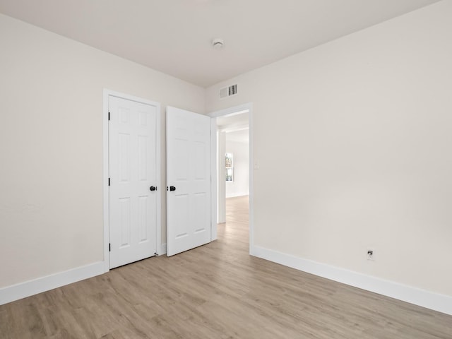 unfurnished bedroom featuring light hardwood / wood-style floors