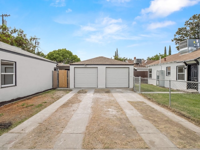 garage with a lawn