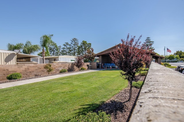 view of yard with fence