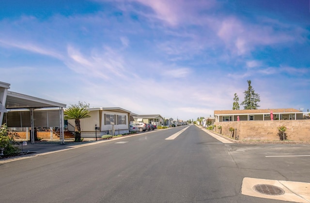 view of road featuring a residential view