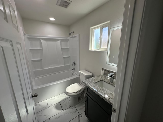 full bathroom featuring vanity, toilet, tile patterned flooring, and tub / shower combination