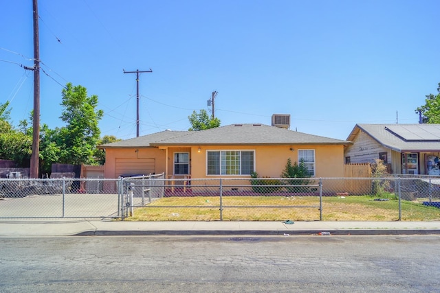 single story home with a front lawn, cooling unit, and solar panels