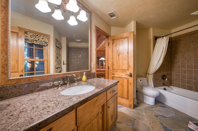 full bathroom featuring tile patterned flooring, vanity, toilet, and shower / bath combination with curtain