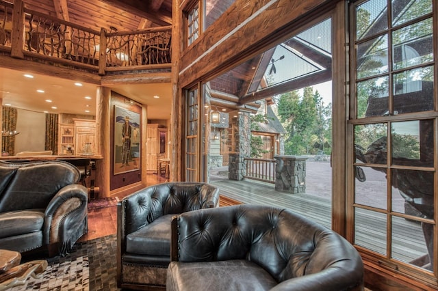 living room featuring wood ceiling, wood-type flooring, high vaulted ceiling, and beam ceiling