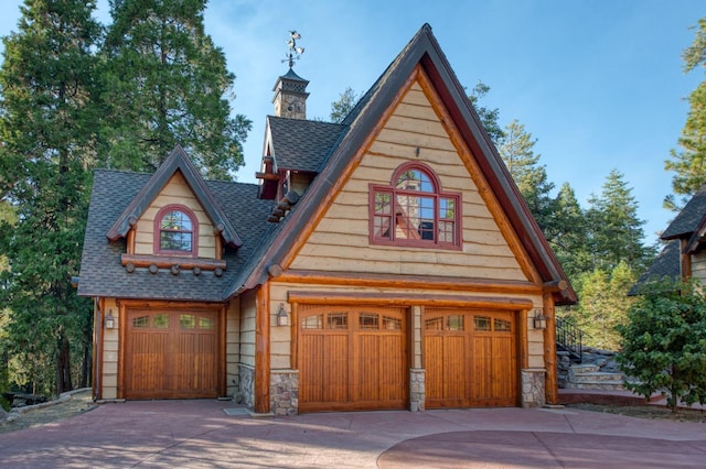 view of front of home with a garage