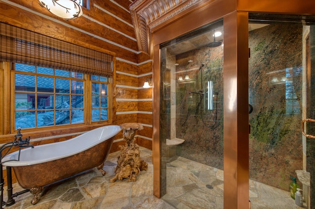 bathroom with independent shower and bath and tile patterned floors