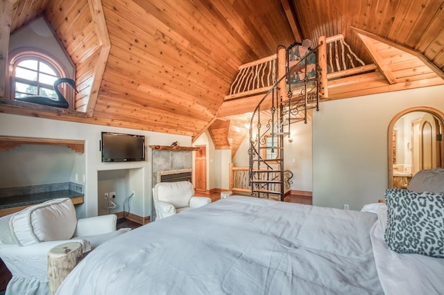 bedroom featuring wood ceiling and lofted ceiling