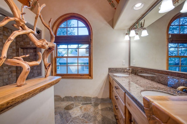 bathroom with tile patterned flooring and vanity