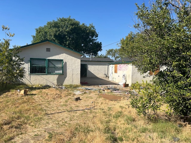 view of front of home with stucco siding