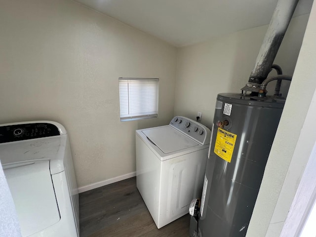 laundry room with water heater, dark hardwood / wood-style flooring, and washer and dryer