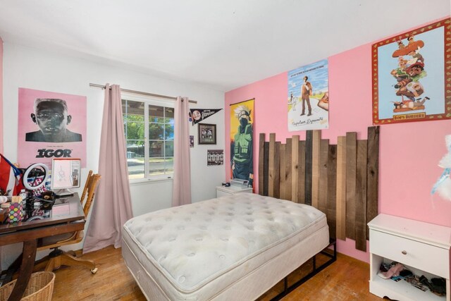 bedroom featuring hardwood / wood-style floors