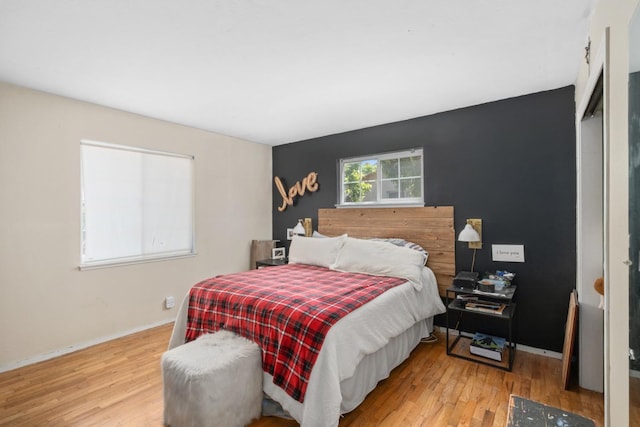 bedroom with light wood-type flooring