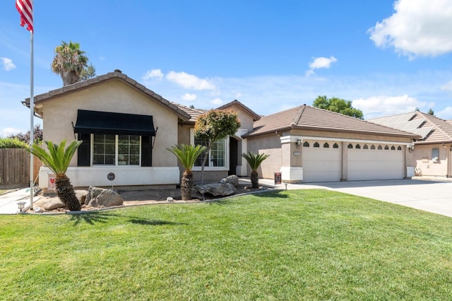 ranch-style home featuring a garage and a front yard