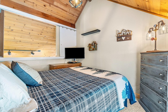 carpeted bedroom with lofted ceiling and wooden ceiling