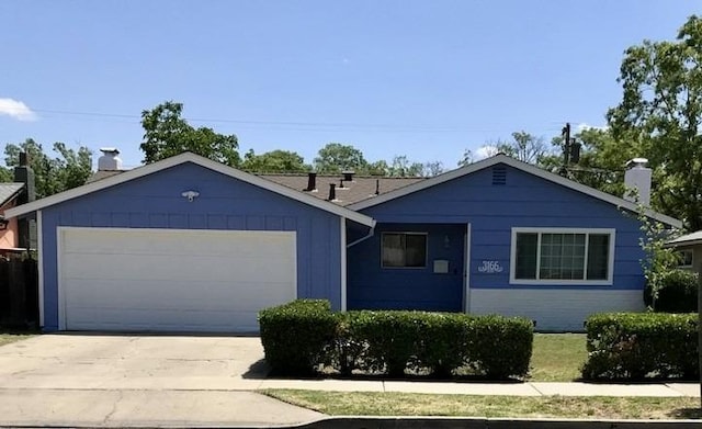 ranch-style house with a garage