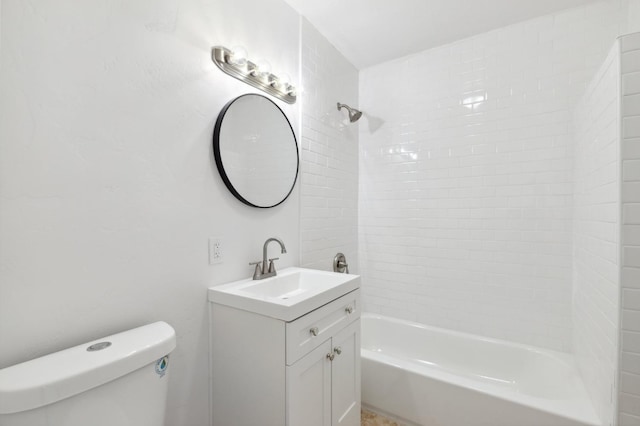 full bathroom featuring shower / washtub combination, vanity, and toilet