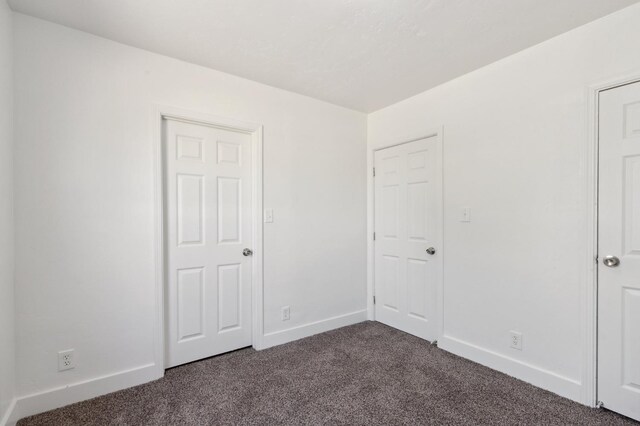 unfurnished bedroom featuring carpet floors