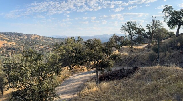 property view of mountains with a rural view