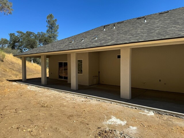 rear view of house with a patio area