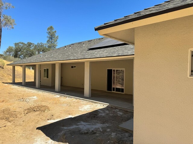 rear view of house featuring a patio