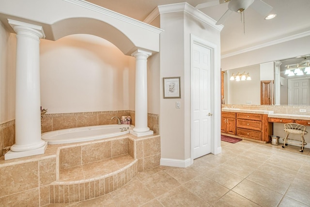 bathroom with crown molding, decorative columns, ceiling fan, a relaxing tiled tub, and vanity