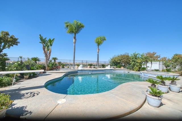 view of pool featuring a patio area