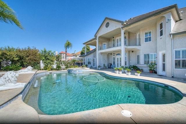 view of pool with a patio area