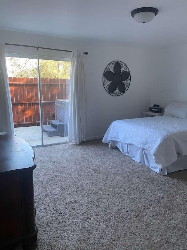 bedroom featuring carpet