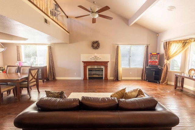 living room featuring ceiling fan, high vaulted ceiling, wood-type flooring, and beamed ceiling