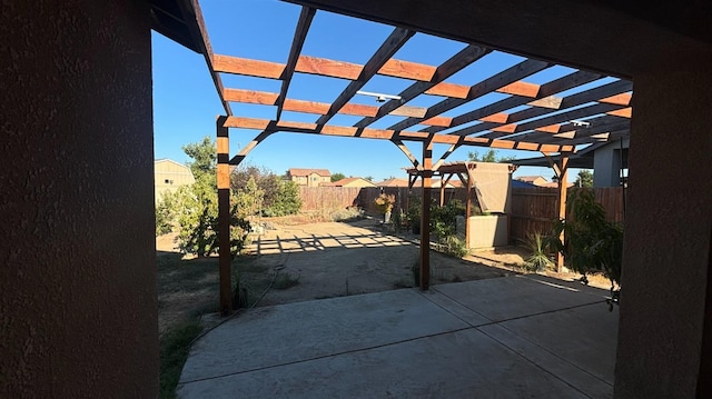 view of patio featuring a fenced backyard and a pergola