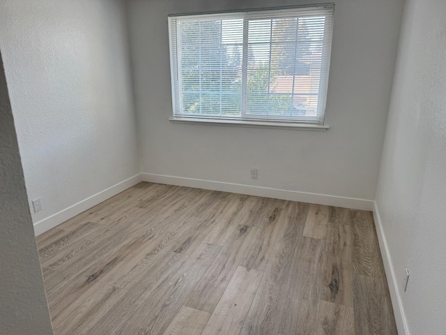 2216 Peach Ave Unit 4, Clovis, CA 93612 - unfurnished room with light wood-type flooring