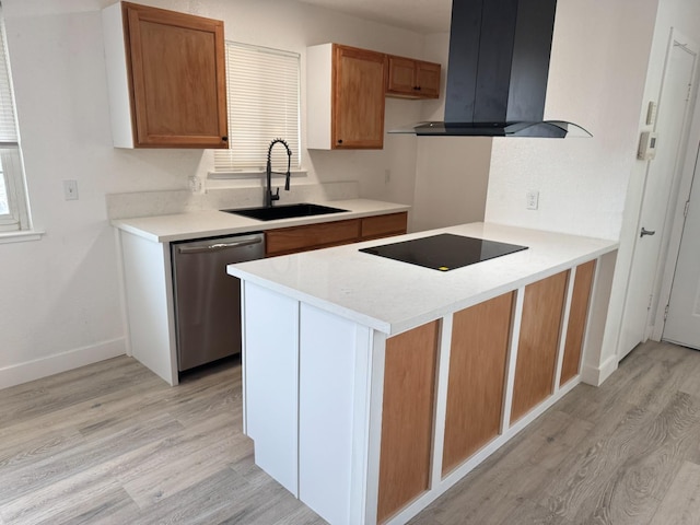 kitchen featuring black electric stovetop, a sink, ventilation hood, dishwasher, and a peninsula