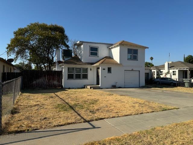 front of property featuring a garage